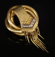 Lot 35 - A Victorian gold split pearl knot brooch