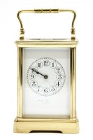 Lot 264 - A brass carriage timepiece