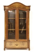 Lot 629 - A French walnut armoire style cupboard