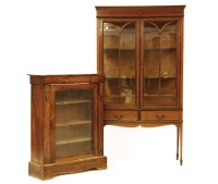 Lot 530 - An Edwardian mahogany strung display cabinet
