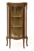 Lot 611 - A French gilt metal mounted 'D' shape display cabinet