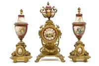 Lot 380 - A late 19th century French gilt bronze and porcelain three piece clock garniture