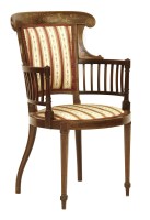 Lot 598 - An Edwardian inlaid mahogany elbow chair
