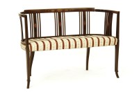 Lot 586A - An Edwardian inlaid mahogany settee