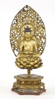 Lot 1414 - A Japanese gilt lacquered wood Buddha