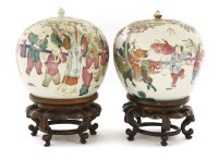 Lot 1081 - Two Chinese famille rose jars and covers