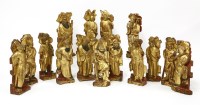 Lot 1297 - A collection of fifteen Chinese carved wooden figures