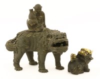 Lot 1462 - A Chinese bronze group