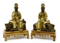 Lot 1463 - A pair of Chinese parcel gilt bronze bodhisattva
