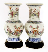 Lot 1465 - A pair of Chinese famille rose vases