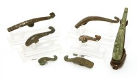 Lot 1230 - A collection of seven Chinese bronze belt hooks
