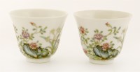 Lot 1510 - A pair of Chinese famille rose wine cups