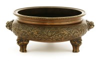 Lot 1237 - A Chinese bronze circular tripod incense burner
