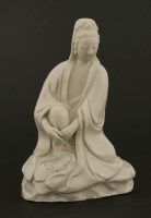 Lot 1121 - A Chinese porcelain blanc de Chine figure of Guanyin