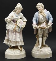 Lot 453 - A pair of early 20th century Continental porcelain figures of a courting couple