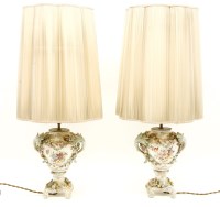 Lot 384 - A pair of Continental porcelain vase lamps