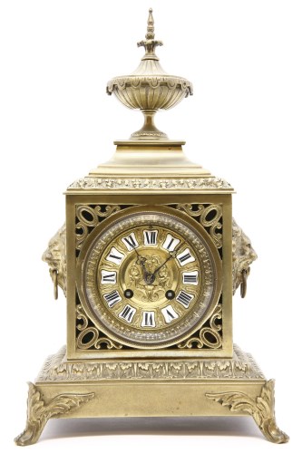 Lot 377 - A late 19th century French brass mantel clock