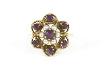 Lot 44 - A 9ct gold amethyst and split pearl floral cluster ring