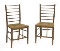 Lot 516 - A pair of Arts & Crafts rush seat chairs