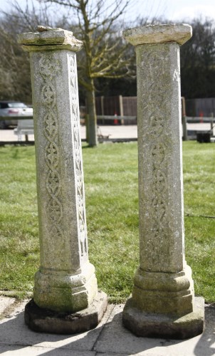Lot 1128 - A pair of Arts and Crafts stone plinths