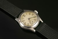 Lot 610 - A gentlemen's stainless steel WWII military issue A.T.P. 94374 Enicar mechanical strap watch