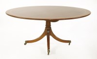 Lot 578 - A Georgian-style circular mahogany dining table