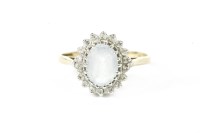 Lot 1 - A 9ct gold aquamarine and diamond oval cluster ring