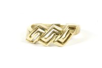 Lot 50 - A Greek key zigzag open head band ring