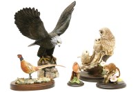 Lot 398 - A Border Fine Arts model of three owls