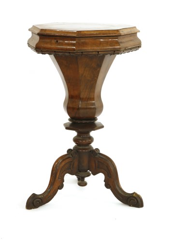 Lot 668 - A Victorian walnut trumpet form work table and tripod base