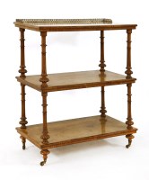 Lot 663 - A Victorian rosewood three tier what not