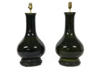 Lot 316 - A pair of Chinese green glazed table lamps