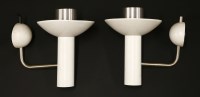 Lot 555 - A pair of Louis Poulsen wall lights