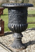 Lot 696 - A large pair of Victorian cast iron campana urns