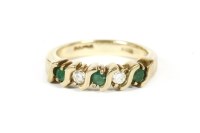 Lot 51 - A 9ct gold five stone circular cut emerald and diamond half eternity ring