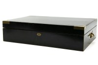 Lot 258 - An ebonised and brass bound Montecristo Havana Humidor cigar case