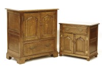 Lot 679 - Titchmarsh and Godwin - An oak TV cabinet with Sony TV