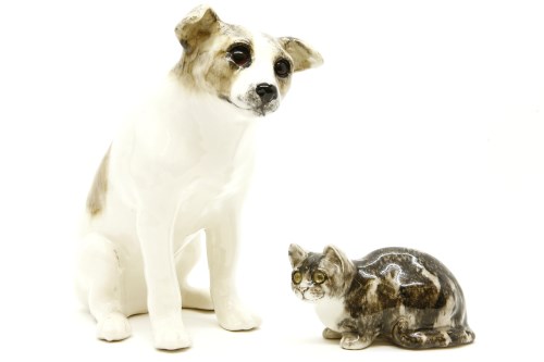 Lot 385 - A Winstanley pottery dog and a cat. Tallest