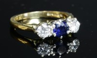 Lot 370 - An 18ct gold sapphire and diamond three stone ring