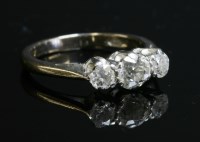 Lot 449 - An 18ct white gold three stone diamond ring