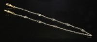 Lot 222 - A platinum and gold watch chain
