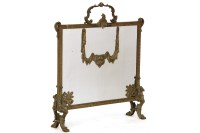 Lot 633 - A cast fire screen