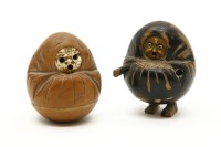 Lot 214 - A pair of Japanese carved nut figures