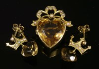 Lot 127 - A Victorian gold citrine and split pearl brooch