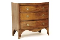 Lot 532 - A George III bow front chest of three drawers