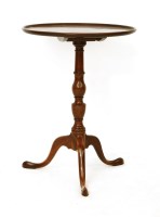 Lot 625 - A Georgian style circular mahogany tripod table