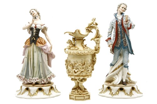 Lot 323 - A pair of Capodimonte figures of a couple