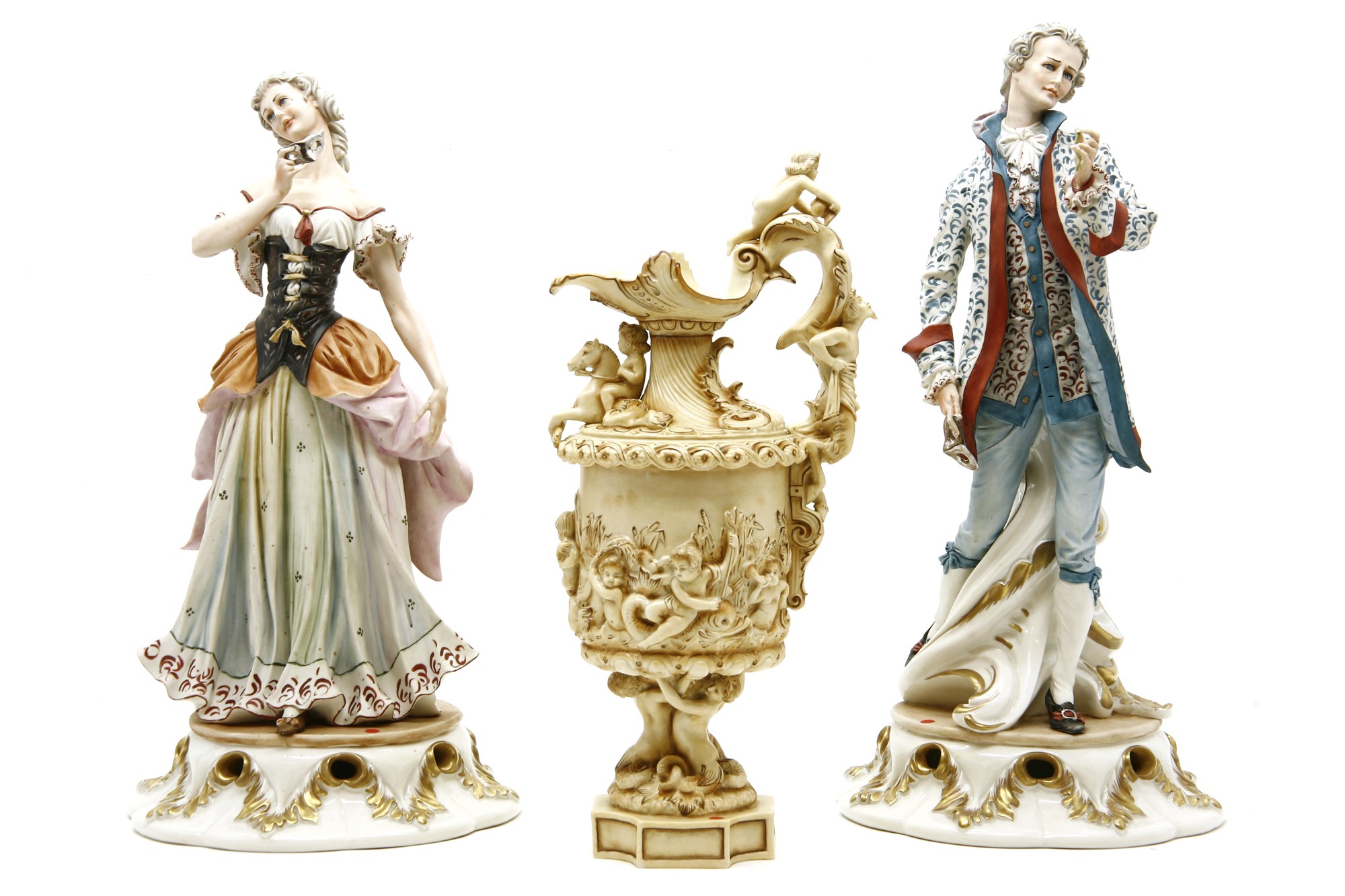 Lot 323 A pair of Capodimonte figures of a couple