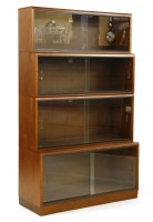 Lot 494 - A mid 20th century simplex teak four sectional book case