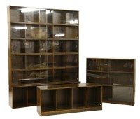 Lot 534 - An oak six section stacking glazed book case